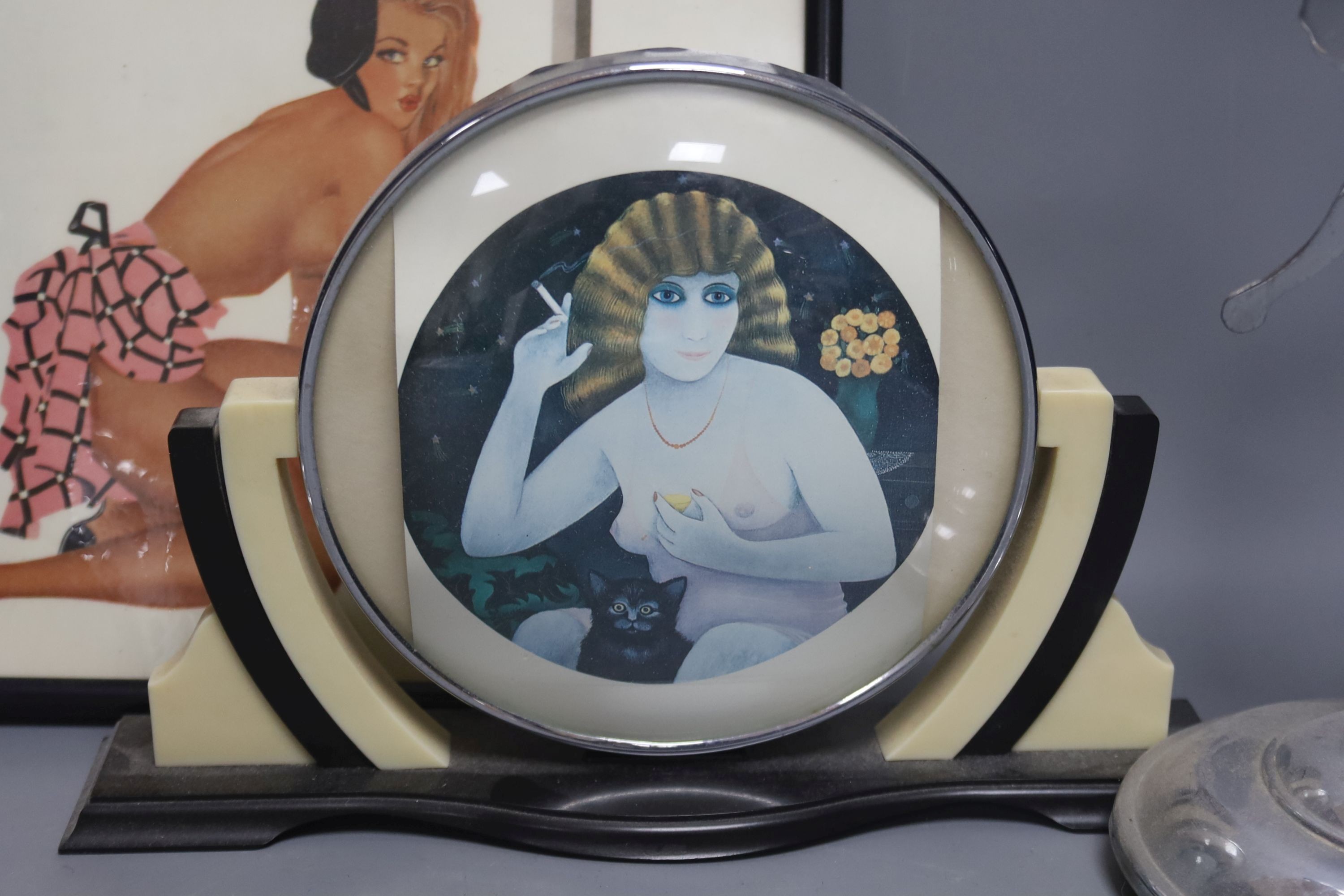 A pair of Deco chromium candlesticks and mantel ornament and framed picture